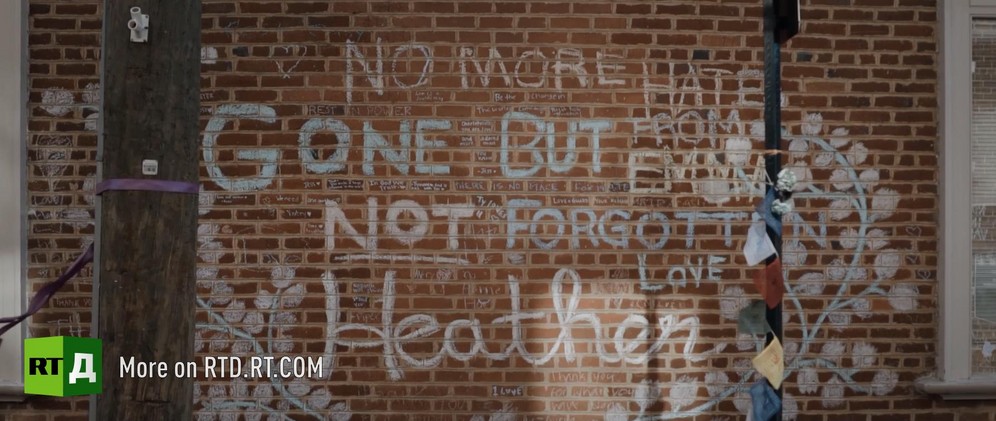 Brick wall with graffiti including 