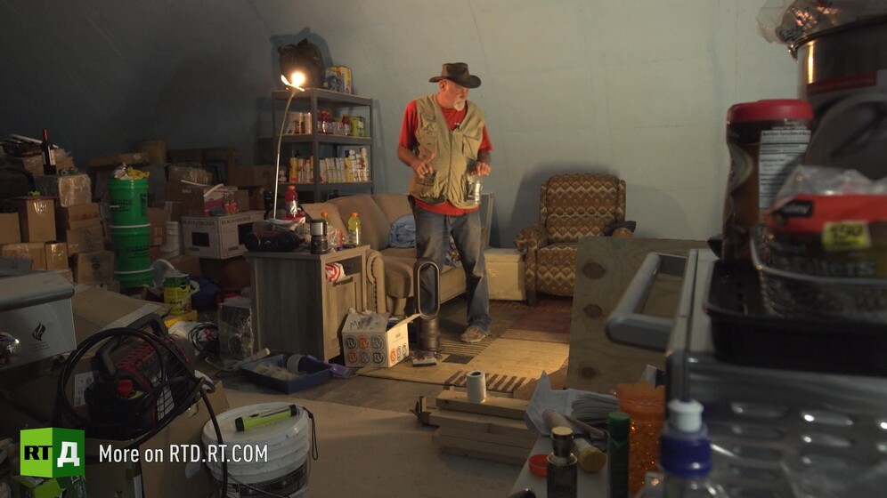 Survivalist in his bunker with stocks of food. Still taken from RTD documentary Armageddon Ready