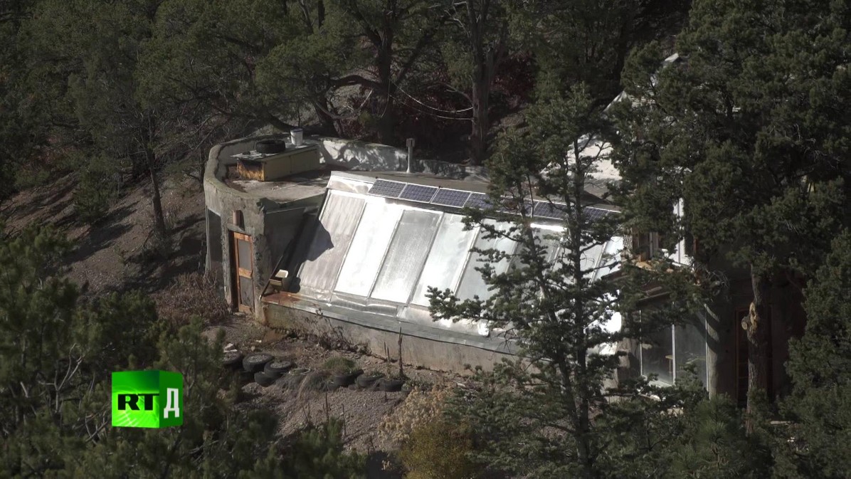 An earthship house in Michael Reynolds' off-grid community