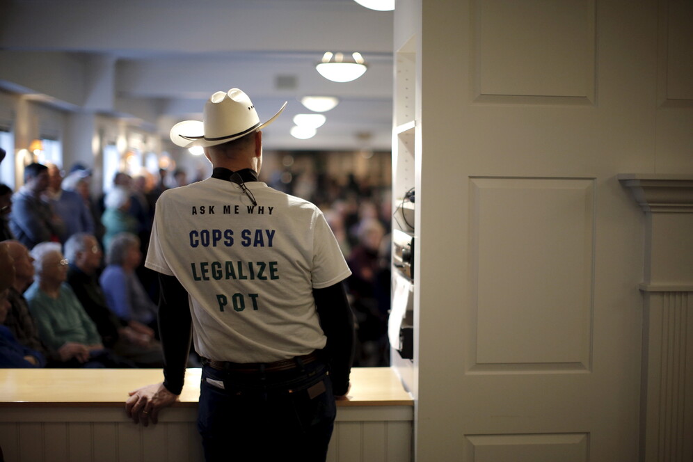 marijuana advocate listens to speech 