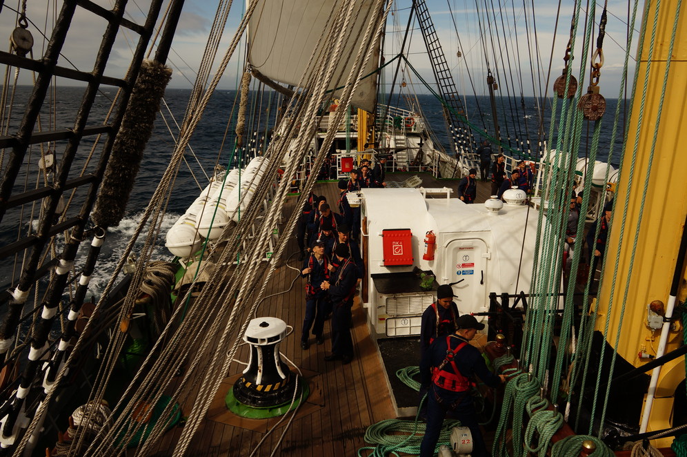 The crew aboard the Kruzenshtern sailing ship